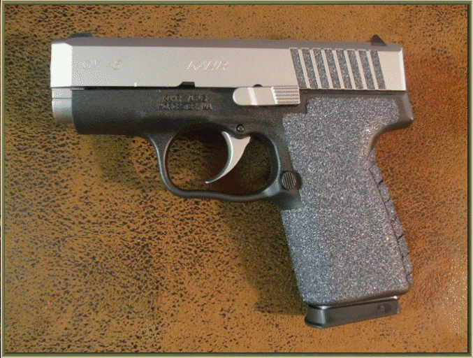 Image of Kahr CM45 with grip enhancements.