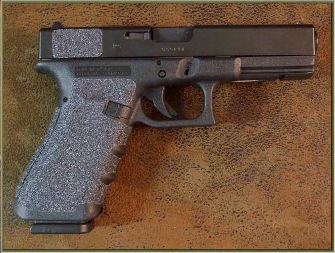 Glock Gen 3 or Gen 4 with sand paper pistol grips installed.