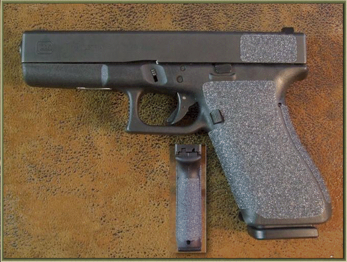 Glock 21 Gen 2 with sand paper pistol grips installed.