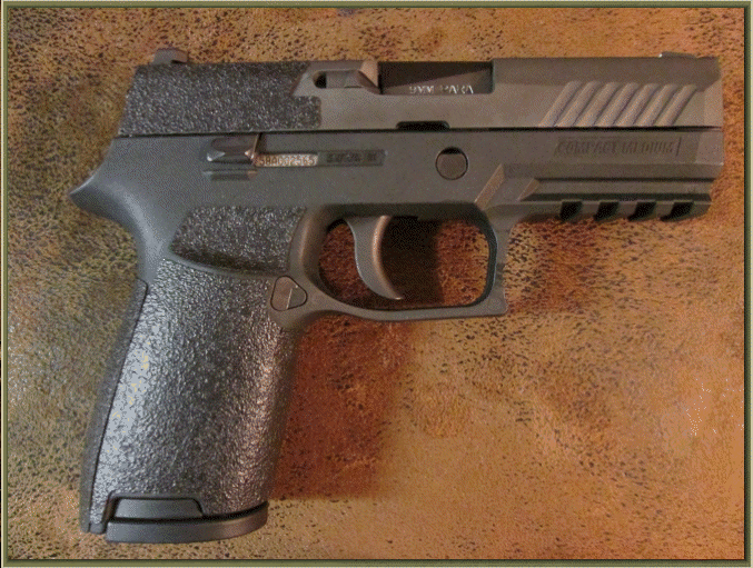 Image of SIG SAUER P320 with grip enhancements.