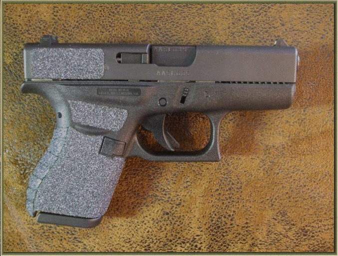 Image of Glock 42 .380 ACP with grip enhancements.