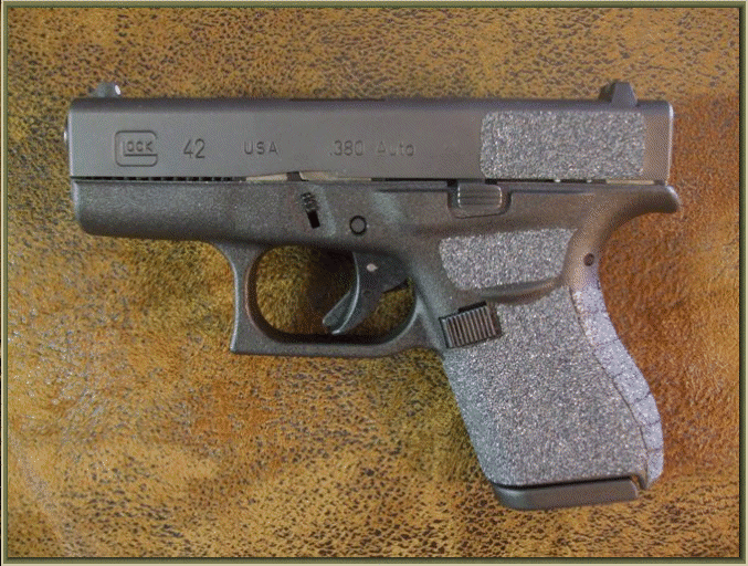 Image of Glock 42 .380 ACP with grip enhancements.