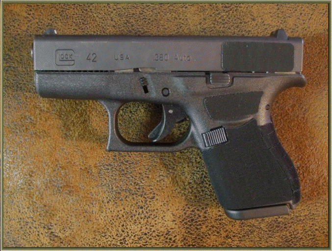 Image of Glock 42 .380 ACP with grip enhancements.