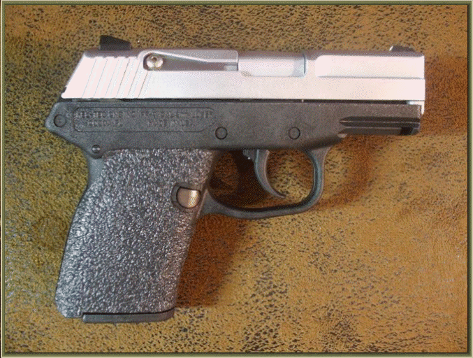 Image of Kel-Tec PF9 with grip enhancements.