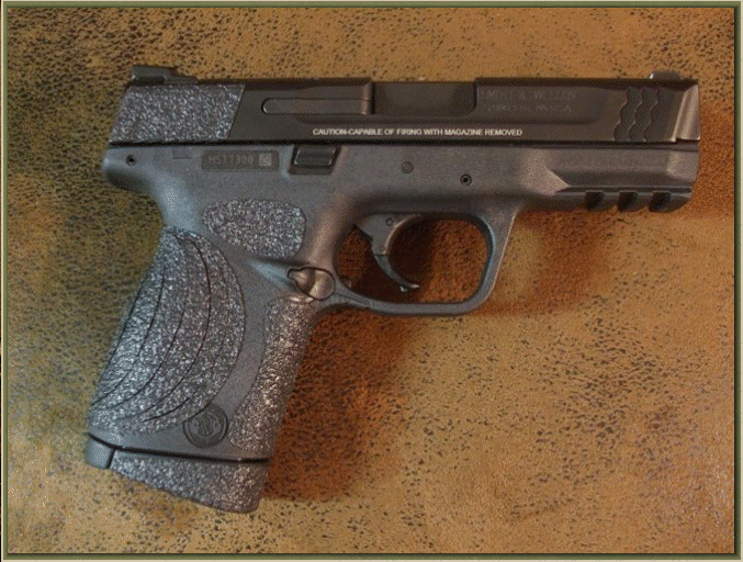 Image of Smith and Wesson M and P COMPACT .45 Auto with grip enhancements.