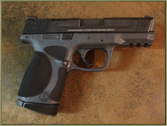 Image of Smith and Wesson M and P COMPACT .45 Auto with grip enhancements.