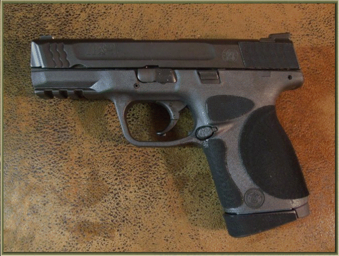 Image of Smith and Wesson M and P COMPACT .45 Auto with grip enhancements.