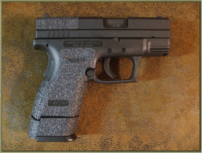Image of Springfield Armory XD Compact 9mm and .40 Caliber with grip enhancements.