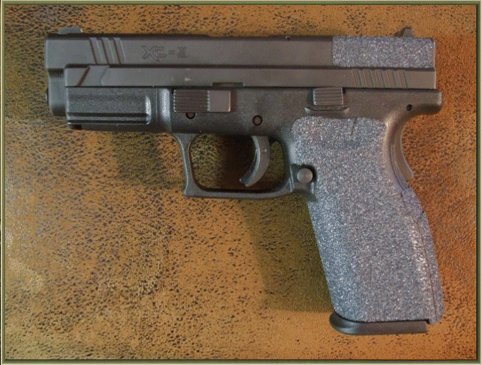 Image of Springfield Armory XD 9mm and .40 Caliber with grip enhancements.
