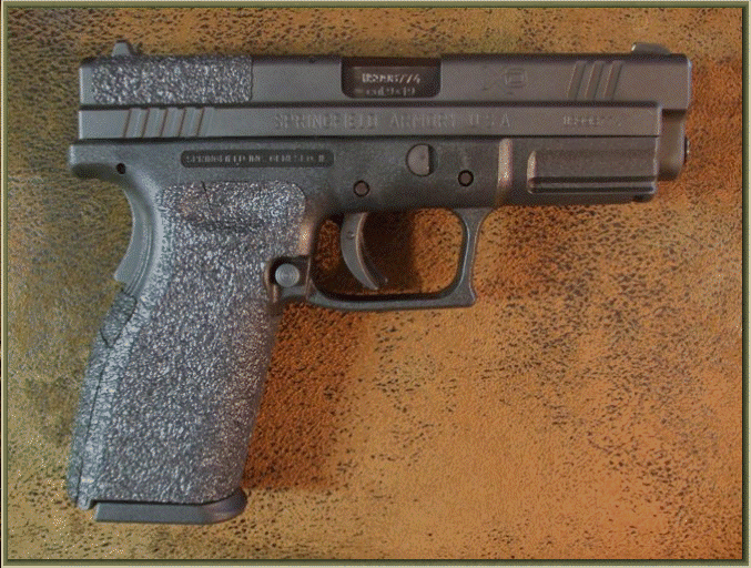 Image of Springfield Armory XD 9mm and .40 Caliber with grip enhancements.