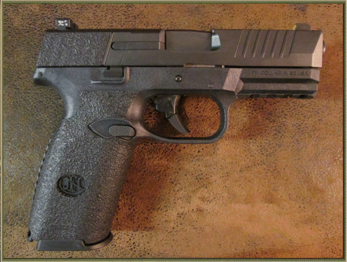 Image of FN 509 with grip enhancements.