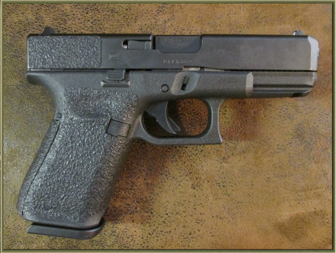 Image of Glock 19 - Gen 5 with grip enhancements.