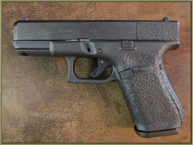 Image of Glock 19 - Gen 5 with grip enhancements.