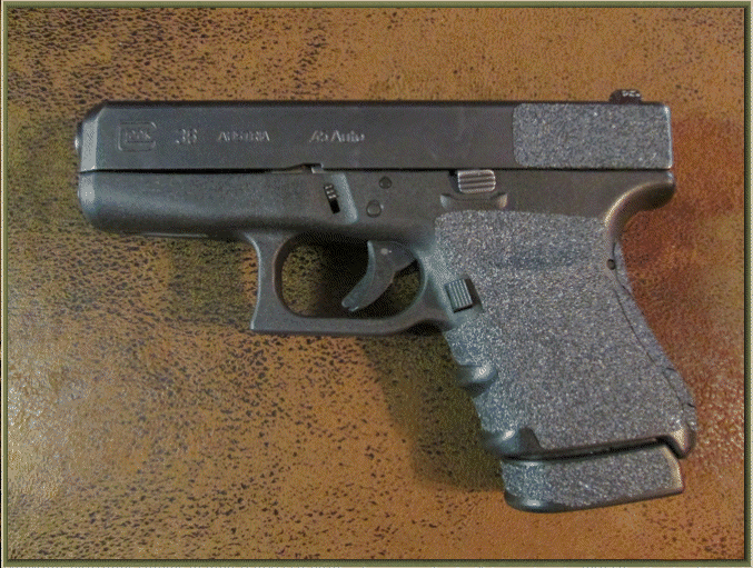 Image of Glock 36 with grip enhancements.