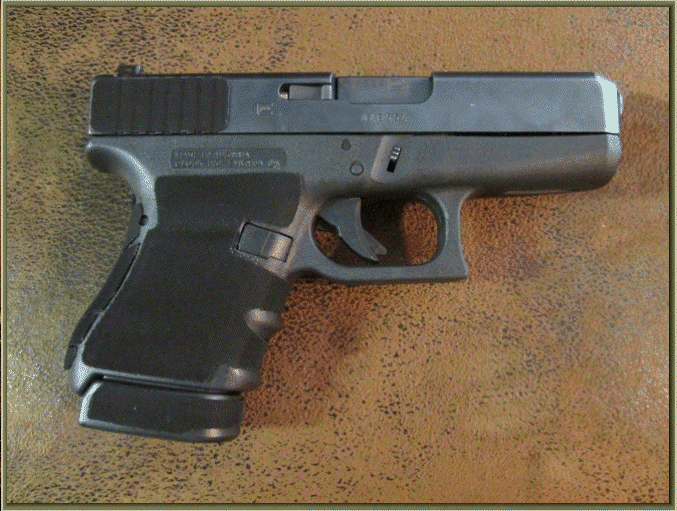 Image of Glock 36 with grip enhancements.