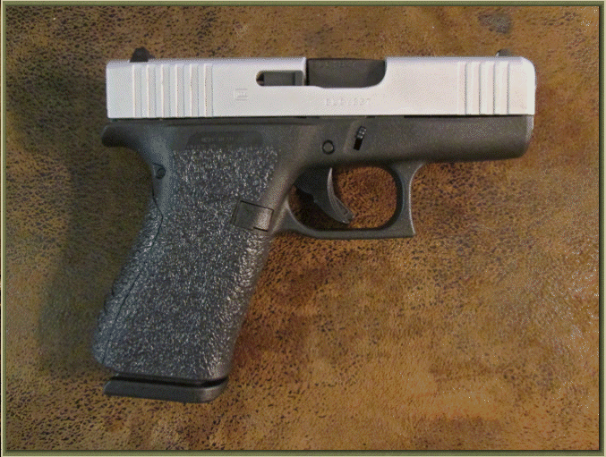 Image of Glock 43X with grip enhancements.