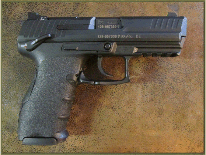 Image of Heckler & Koch P30 or VP9 with grip enhancements.