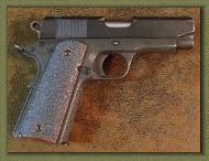 Rock Island Armory .45 Auto with sand paper pistol grip enhancements.