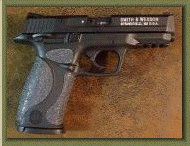 Smith & Wesson M&P 22 with sand paper pistol grip enhancements.