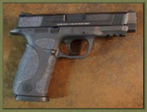 Smith & Wesson M&P 45 with sand paper pistol grips installed.