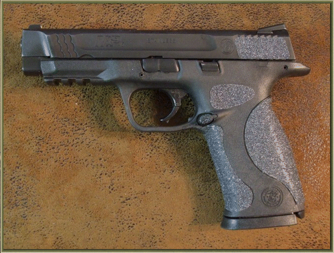 Smith & Wesson M&P 45 with sand paper pistol grips installed.