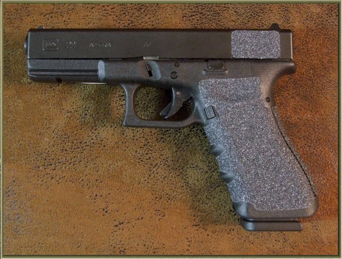 Glock 22 with sand paper pistol grips installed.