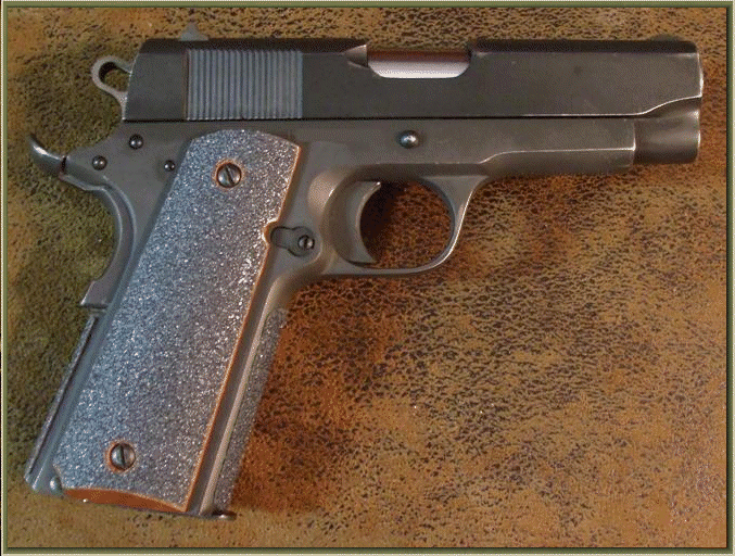 Image of Rock Island Armory - Armscor .45 Auto (1911 clone) with Complete Coverage Sand Paper Pistol Grips Installed - Right Hand 
View