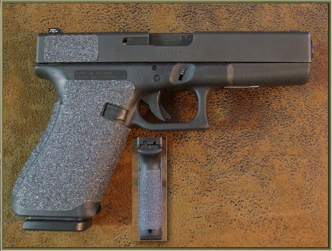 Glock 21 Gen 2 with sand paper pistol grips installed.