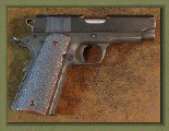 Rock Island Armory - Armscor .45 Auto with sand paper pistol grip enhancements.