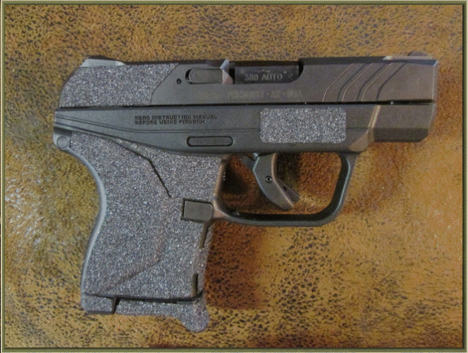 Image of Ruger LCP II .380 ACP with grip enhancements.