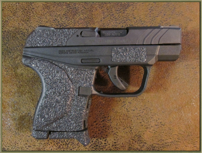 Image of Ruger LCP II .380 ACP with grip enhancements.