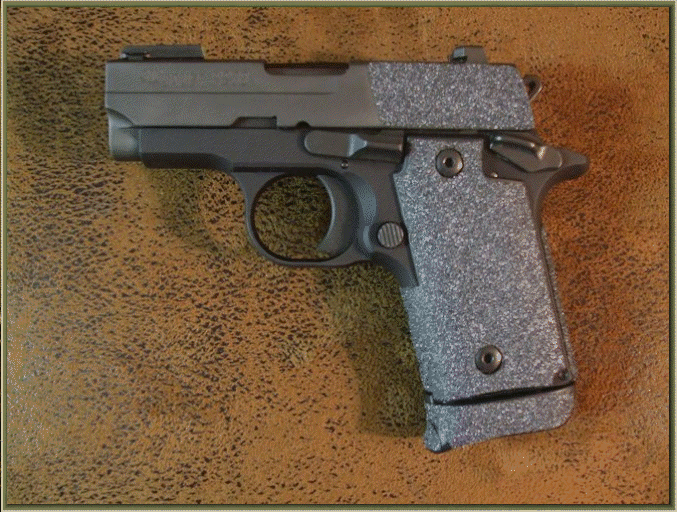 Image of SIG SAUER P238 380 Auto with grip enhancements.