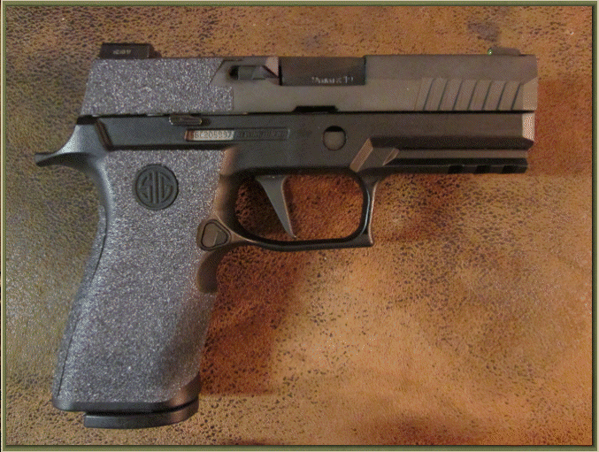 Image of Sig Sauer P320 X-Carry with grip enhancements.