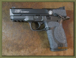Smith and Wesson SD9VE with Grip Enhancements