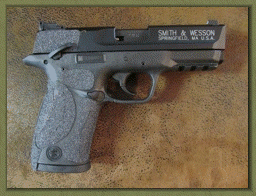 Smith and Wesson SD9VE with Grip Enhancements