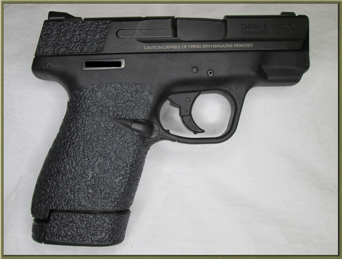 Image of Smith and Wesson SHIELD M2.0 with grip enhancements.